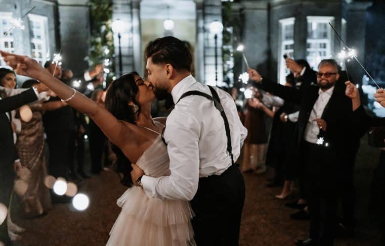 Guests dancing joyfully at all-inclusive wedding package