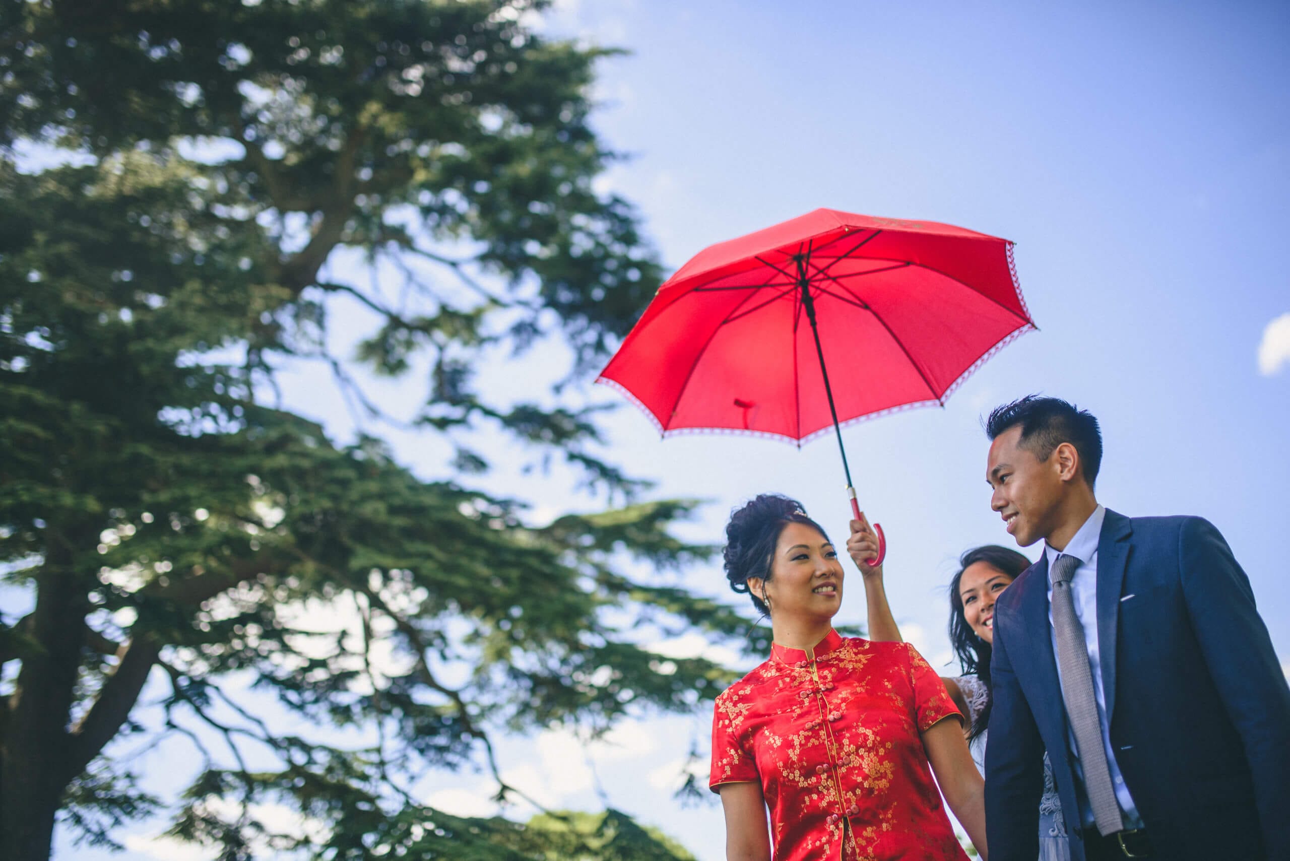 red umbrella at Chinese wedding to ward off evil spirits